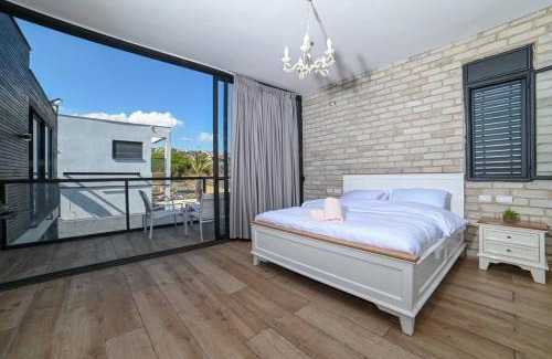 Migdal Villa | וילאה- וילות מושלמות למשפחות עם ממ"ד ובריכות פרטיות ליד הכנרת