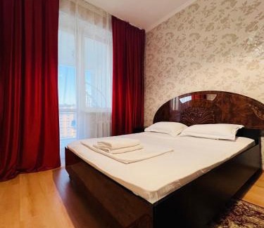 Nur-Sultan Apartment | 153 Уютные апартаменты с видом на Байтерек и поющие фонтаны с 2 кроватями King и диваном на 10 этаже
