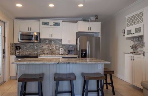 Key Colony Beach House | A piece of paradise! Adorable 2 bedroom, 2 bathroom canal front half duplex