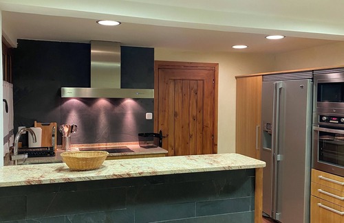 Osseja Apartment | A stone cocoon just 10 minutes from the hot springs and hiking trails.