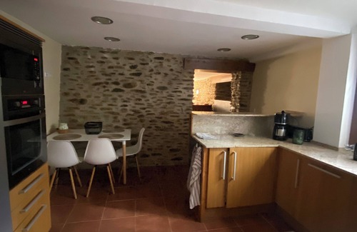 Osseja Apartment | A stone cocoon just 10 minutes from the hot springs and hiking trails.