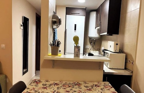 Plaza De La Costera Apartment | Apartment 'Atico Bellreguart' with Shared Pool, Wi-Fi and Air Conditioning