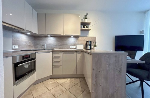 Duhnen Apartment | Apartment directly behind the dike for 2 persons, swimming pool, whirlpool, sauna