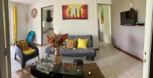 Rifflet Apartment | Appartement avec vue jardin à Deshaies 80 m² avec piscine