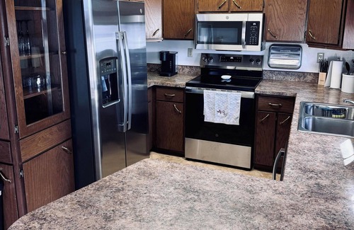 Spearfish House | Authentic Spearfish Home 1 Block from Black Hills State- Sleeps 8