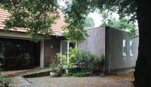 Heukelom Bed & Breakfast | B&B Even Heukelom - Kamer met Tuin