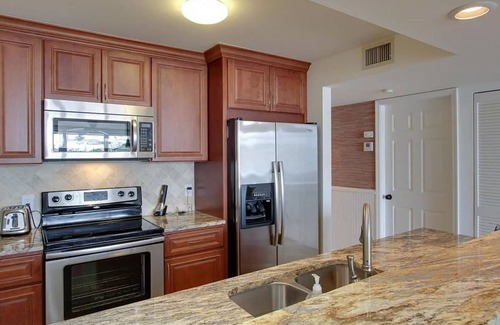 Moorings Condo | Beautiful marina views, manatees and private beach in the Moorings of Vero!