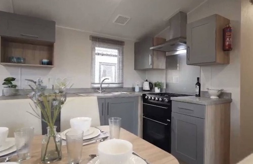 Cresswell House | Beautiful new caravan with decking - 500 yards to beach