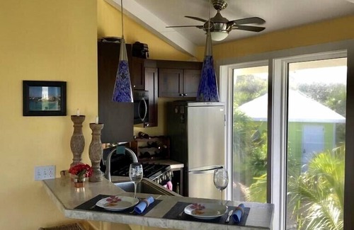 Hope Town Cottage | Beautiful Solar Powered Romantic Retreat With Dock Slip