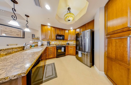 Cape Harbour Condo | Beautiful water-view condo with pools, gym, hot tub, 2 balconies, washer/dryer