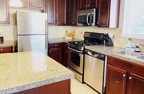 Aurora Condo | Bedroom and Private Bath with Study in Aurora, CO