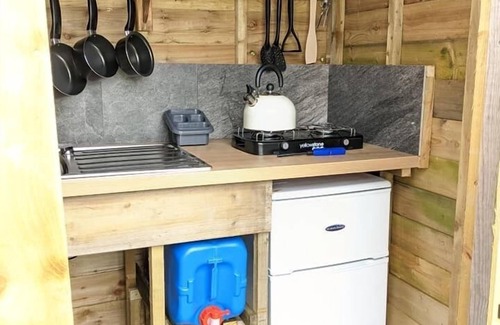 Mount Hawke RV Rental | Bell tent with separate own kitchen pet friendly