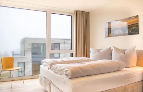 Marienleuchte Apartment | BeltBlick 30 – Moderne Ferienwohnung mit Dachterrasse direkt an der Ostsee!