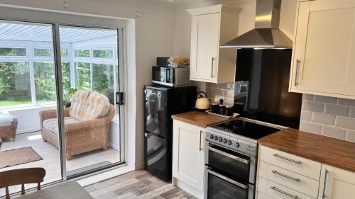 Pentraeth House | 'Blue Sky' 2 Bedroom Enclosed Garden Parking WiFi