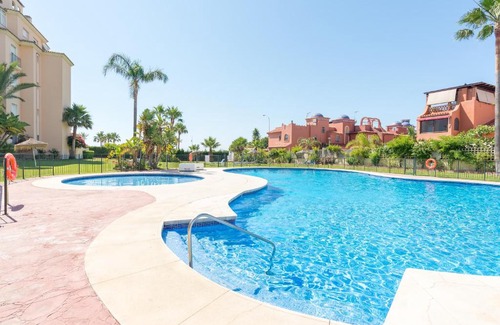 Torremolinos Apartment | BOHO CHIC- Beachfront - Free bikes - Salt water pool