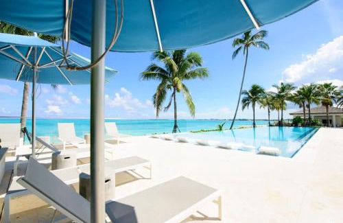 Nassau House | Cable Beach Condo Large private patio with BBQ