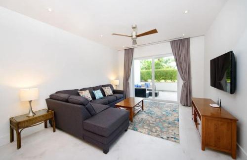 Nassau House | Cable Beach Condo Large private patio with BBQ