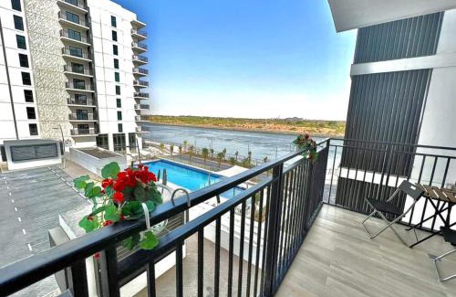 Abu Dhabi Apartment | Canal-view 1br Balcony Pool Near F1 & Parks
