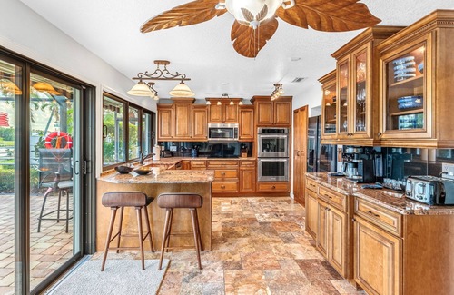 Cocoa Isles House | CanalFront | Heated Pool + Game Room w/Pool Table