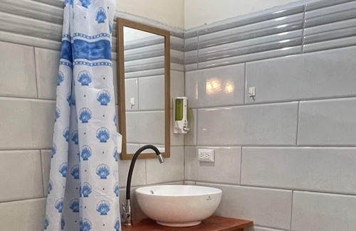 Cahuita Apartment | Caribbean style second floor apartment.
