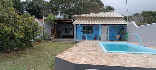 Tamoios House | Casa em Unamar com piscina privativa