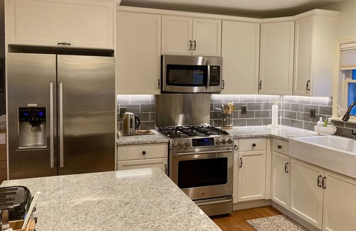 East Marion House | Charming French Country waterfront, Bay Beach. Hot tub! New rates & Discounts!