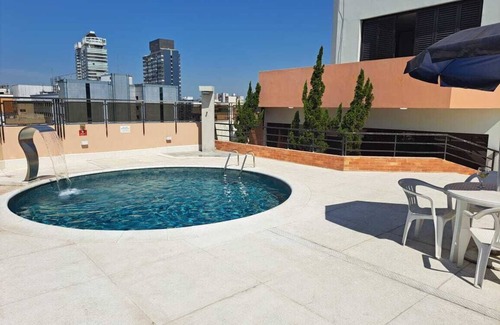 Gonzaga Apartment | Cosmopolitan Praia Flat