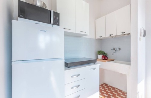 Lido di Pomposa Apartment | Cosy 40 sqms apartment, perfect for 3 people, located on the second floor (NO lift) of a building with shared garden and private parking. The property is located a few steps from the beach (300 metres), in an area full of services, including bars, restau