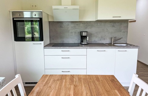 Hechthausen Apartment | Cosy apartment for 4 people with WIFI, pool, TV, terrace and pets allowed