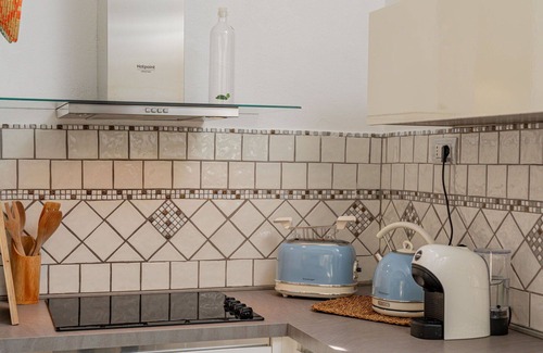 Eden Beach Villa | Cosy apartment in villa for 5 guests with A/C, pool, WIFI, TV and patio