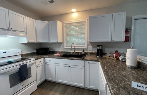 Lincolnville House | Discounted Charleston King Suite Hot Tub FirePlace