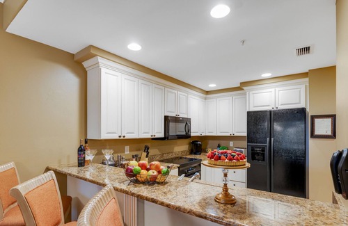 Redevelopment Area Condo | Downtown Bellasera Resort Condo with On-Site Restaurant, Pool & Private Patio