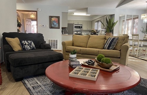 Mount Ida Condo | Forest view, log-sided two bedroom, two bath condo on Lake Ouachita. by RedAwning