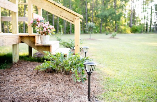 Swansboro Cottage | “Glamping” cute tiny cottage with huge outside area to hang out by the fire pit