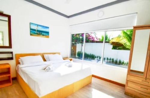 Thulusdhoo Island House | Go Surf Maldives