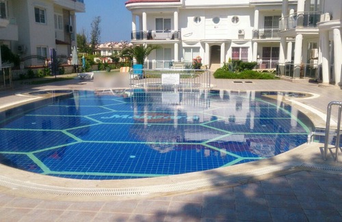 Fethiye City Center Apartment | Ground Floor Apartment on a private complex with gardens and swimming pool