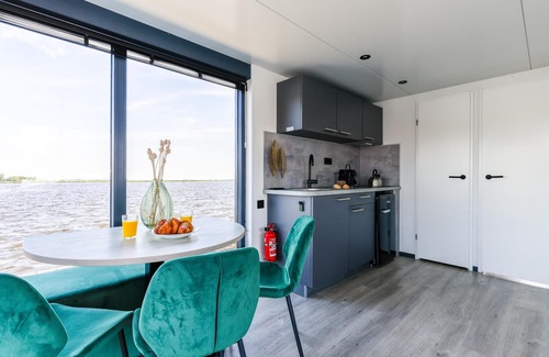 Municipality of Uitgeest Boat Rental | Houseboat with lake view and air conditioning