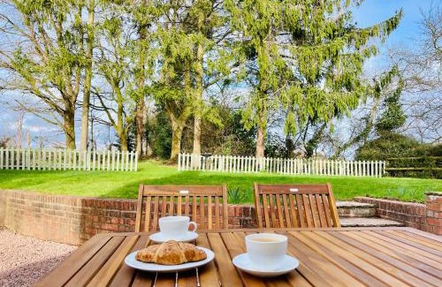 Whitbourne House | Log- burner, Hot tub with woodland views Walking trails and local pub on your doorstep! Popular walking trails nearby-Malvern Hills and the Brockhampton Estate- Peaceful village on the border of Hereford and Worcester