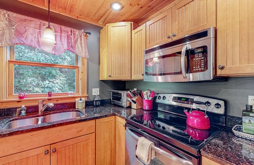 Sunday River Area Ski Chalet | Log cabin 1 mile from Sunday River with hot tub, fireplace & Ping-Pong