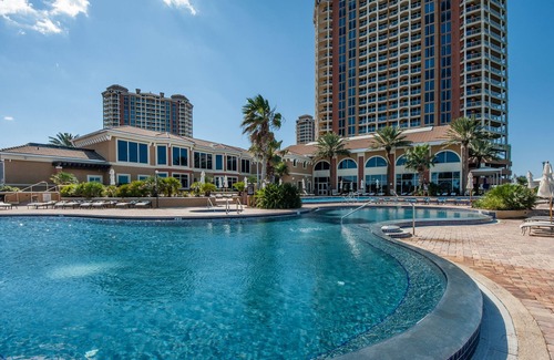 Pensacola Beach Condo | Luxurious Portofino Resort Condo, Panoramic Ocean Front Views, 8 Pools, Steps From The Beach!