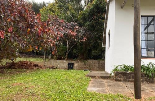 Hibiscus Coast Villa | Luxury modern farm cottage with sea view