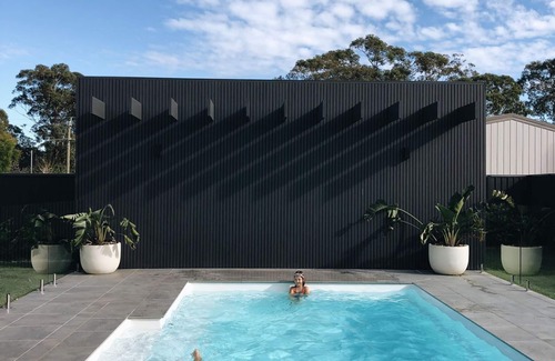 Callala Bay House | Luxury waterfront home, heated pool, aircon and fireplace in Jervis Bay