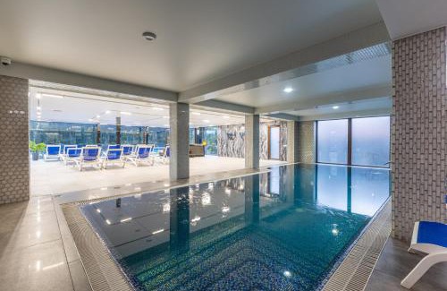 Bukovel Hotel | MARION SPA Hotel & Spa - RENOVATION - Rooms, SPA area, Swimming pool, Reception, Restaurant, Lounge Bar, Hookah bar, Children's room, Parking, SPA and Breakfast included in the price