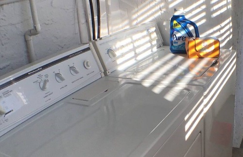 Riviera Bay Apartment | Mid-century Inspired Apt in Historic Building w/ Patio - 10 Minutes to Downtown