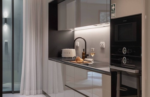 Old Town Apartment | Modern 1-Bedroom w/Private Patio @ Savoy Insular