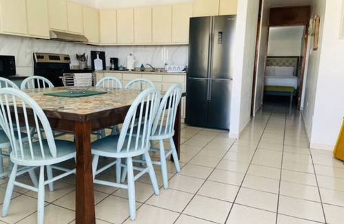 Vega Baja House | Nana’s Blue Beach Apartment is breazy, cozy and just minutes from the beach.