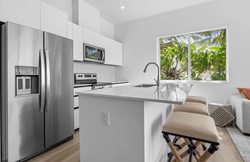 Northwest Point Apartment | Oceanfront Sunset Patio w BBQ Pool Gym Spa