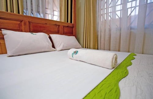 Kampala Hotel | Palm gardens and guesthouse
