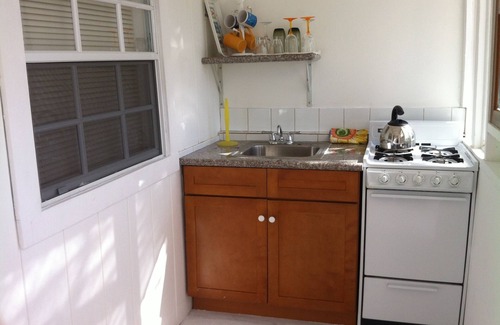 Freeport Apartment | Paradise on miles of white sandy beach and turquoise sea, private and secure.
