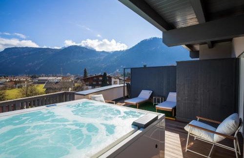Kramsach Apartment | PENTHOUSE N`3 - Stylish Apartment with Rooftop Whirlpool Access by AlpenLuxus
